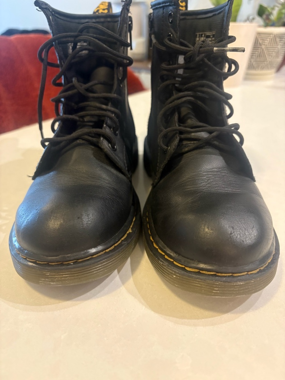 Dr. Martens Black Leather Lace-Up Combat Boots with Yellow Stitching